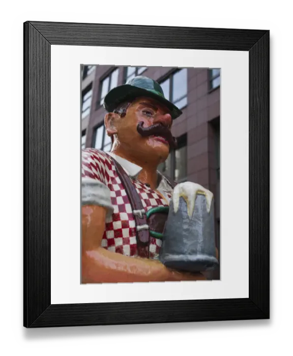 Framed Print : Germany, Berlin, Mitte, Friendrichstrasse, statue of large Bavarian man with beer stein Framed Print : Germany, Berlin, Mitte, Friendrichstrasse, statue of large Bavarian man with beer stein