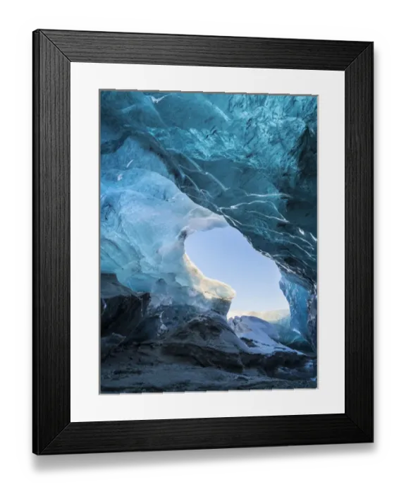 Framed Print : Ice cave in the glacier Breidamerkurjoekull in Vatnajoekull National Park. Entrance to the Ice Cave