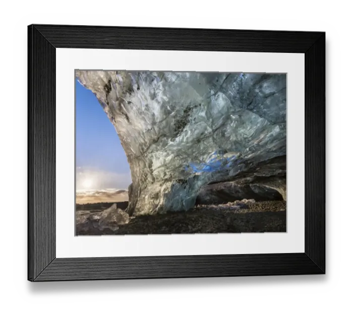 Framed Print : Ice cave in the glacier Breidamerkurjoekull in Vatnajoekull National Park. Entrance to the Ice Cave