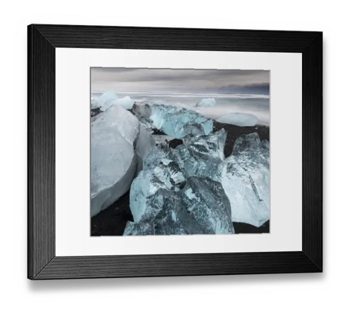 Framed Print : icebergs on black volcanic beach. Beach of the north atlantic near the glacial lagoon Joekulsarlon Framed Print : icebergs on black volcanic beach. Beach of the north atlantic near the glacial lagoon Joekulsarlon