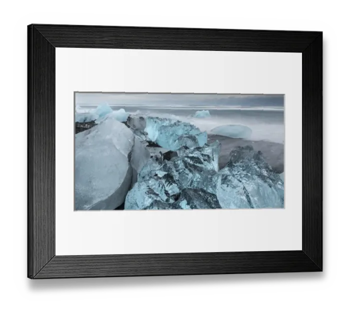 Framed Print : icebergs on black volcanic beach. Beach of the north atlantic near the glacial lagoon Joekulsarlon Framed Print : icebergs on black volcanic beach. Beach of the north atlantic near the glacial lagoon Joekulsarlon