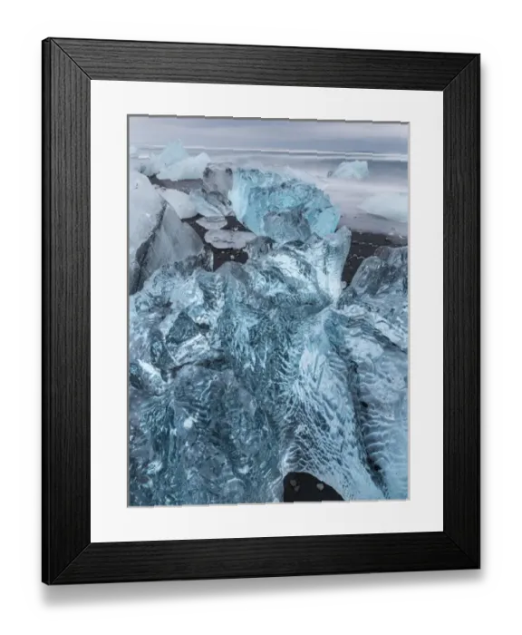 Framed Print : icebergs on black volcanic beach. Beach of the north atlantic near the glacial lagoon Joekulsarlon Framed Print : icebergs on black volcanic beach. Beach of the north atlantic near the glacial lagoon Joekulsarlon