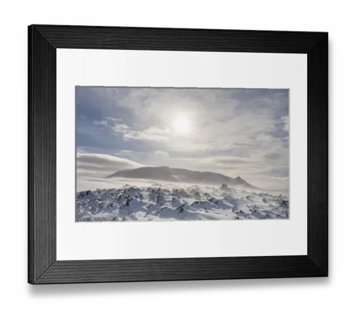 Framed Print : The Highland of Iceland close to the ring road during winter in stormy and sunny weather conditions