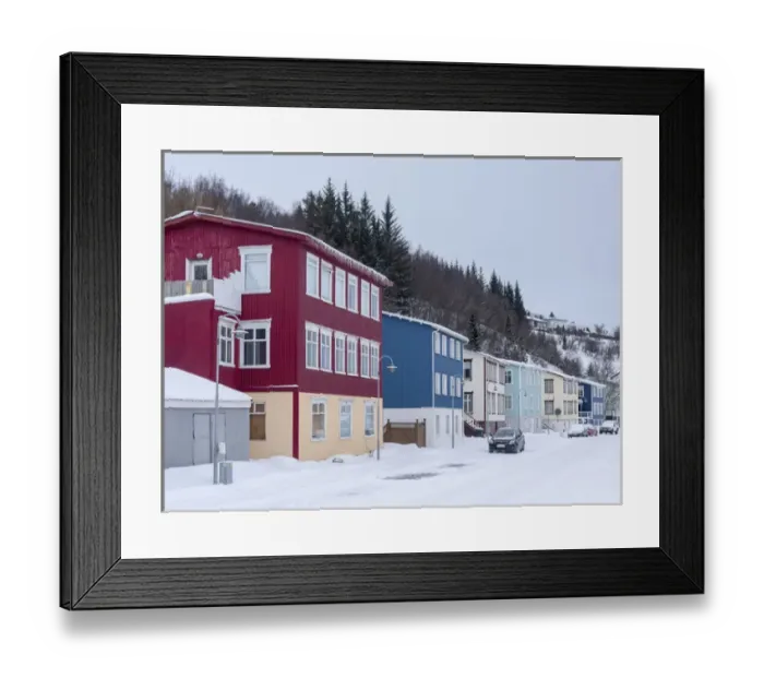 Framed Print : Akureyri during winter. Old town with traditional and historic buildings