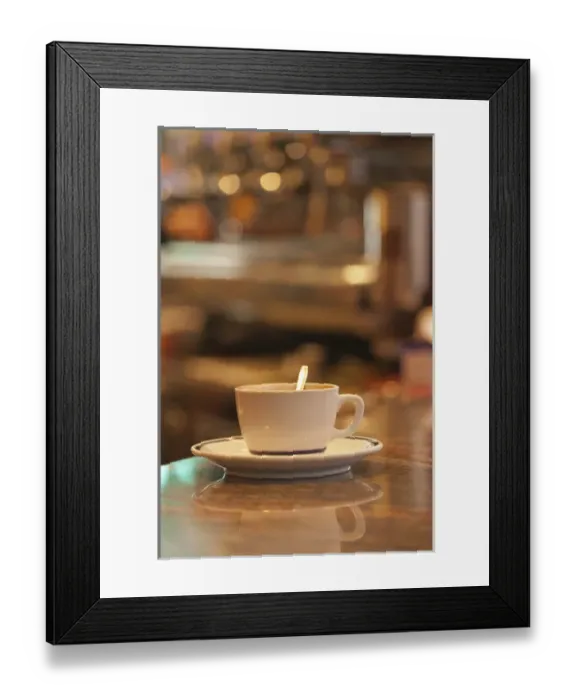 Framed Print : Italy, Venice. A cup of coffee and surrounding ambience of a cafe