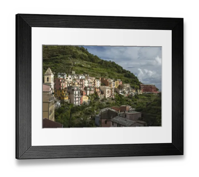 Framed Print : Italy, Cinque Terre, Manarola. View of Manarolas houses amidst the steep hillsides