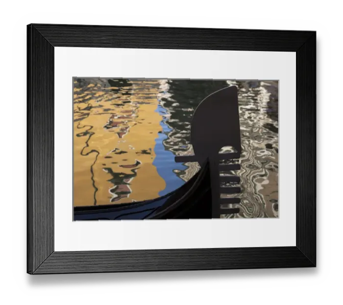 Framed Print : Italy, Venice. The silhouette of a gondola against a background of colorful water Framed Print : Italy, Venice. The silhouette of a gondola against a background of colorful water