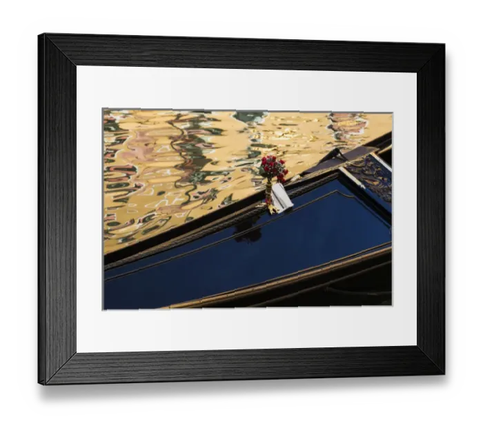 Framed Print : Italy, Venice. A gondola detail and colorful water reflections Framed Print : Italy, Venice. A gondola detail and colorful water reflections