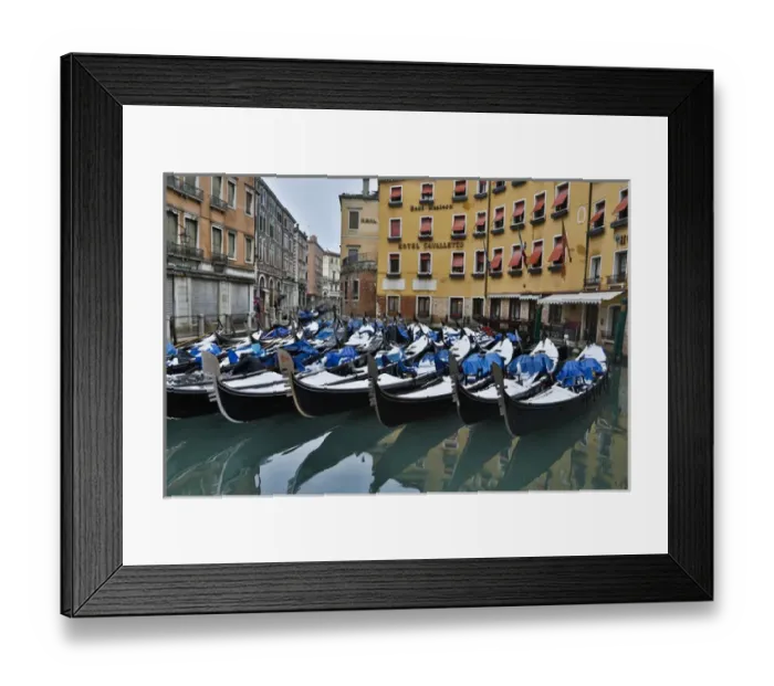 Framed Print : Fresh snow on Gondolas along the canals of Venice, Italy Framed Print : Fresh snow on Gondolas along the canals of Venice, Italy