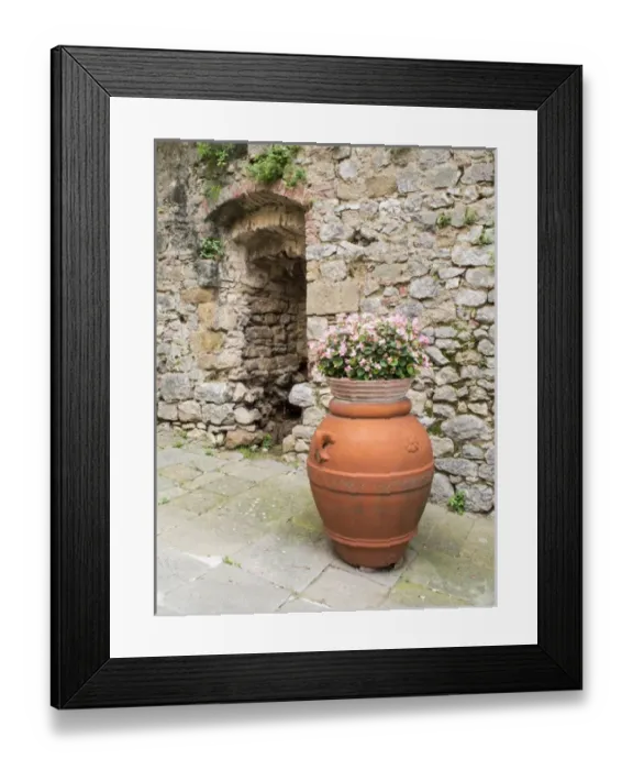 Framed Print : Europe, Italy, Tuscany, Montefollonico. Pot and flowers in the medieval town of