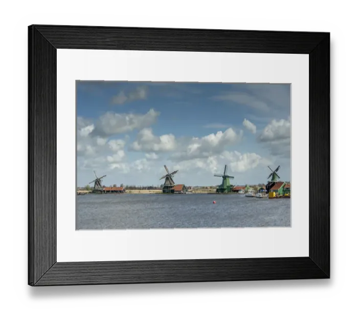 Framed Print : WIndmills along a lake in a peaceful country scene Framed Print : WIndmills along a lake in a peaceful country scene