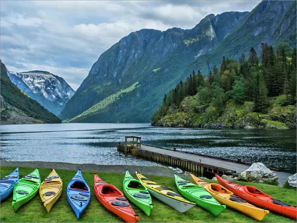 Gudvangen Norway fabulous fjord called Naeroyforden Fjord with colorful kayaks in water