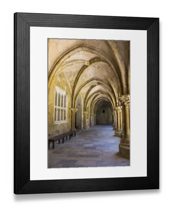 Framed Print : Portugal, Coimbra. Old Cathedral cloister. Archways, walking paths, courtyard