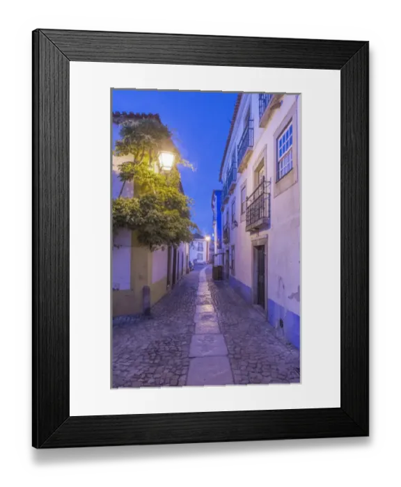 Framed Print : Portugal, Obidos, Cobblestone Street in the Historic Cente at Dawn Framed Print : Portugal, Obidos, Cobblestone Street in the Historic Cente at Dawn