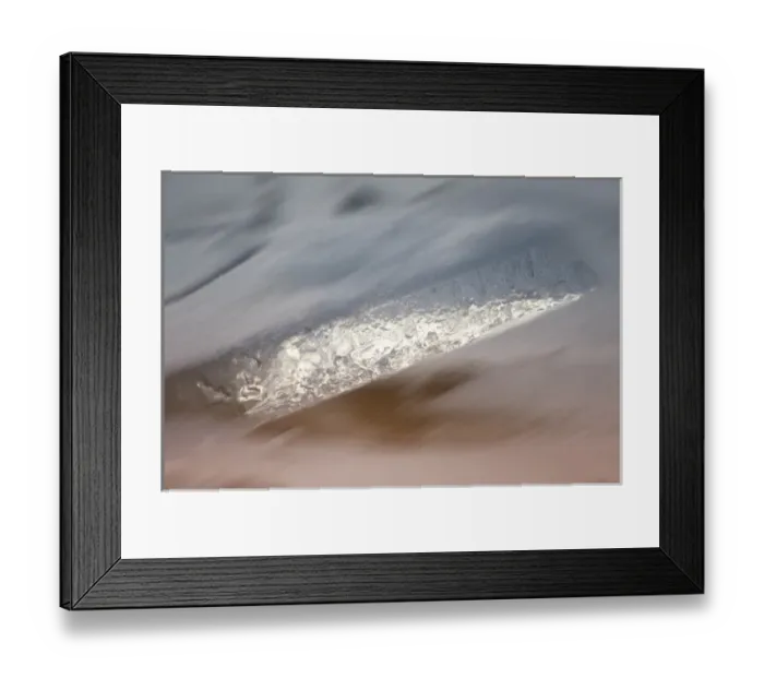 Framed Print : Slab of ice created on edge of lake
