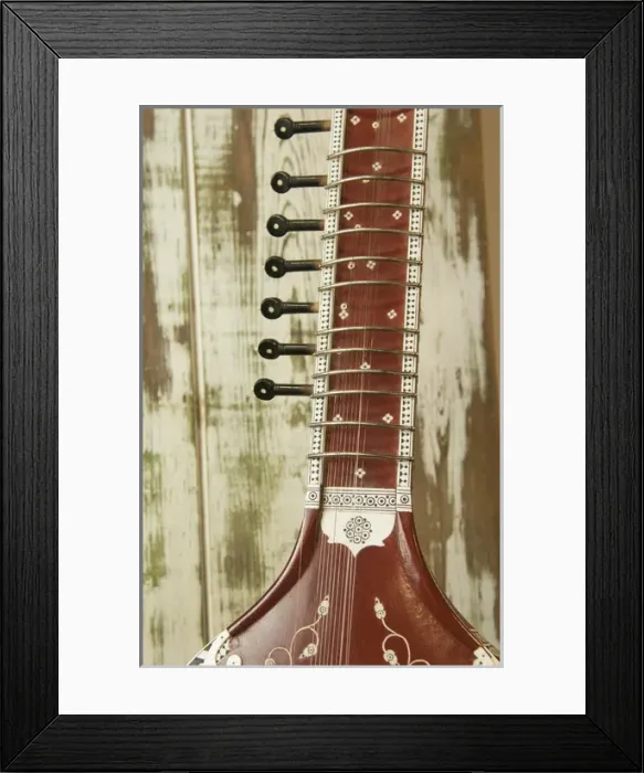 Framed Print : Close up abstract of a wood indian sitar string insturment of music in India