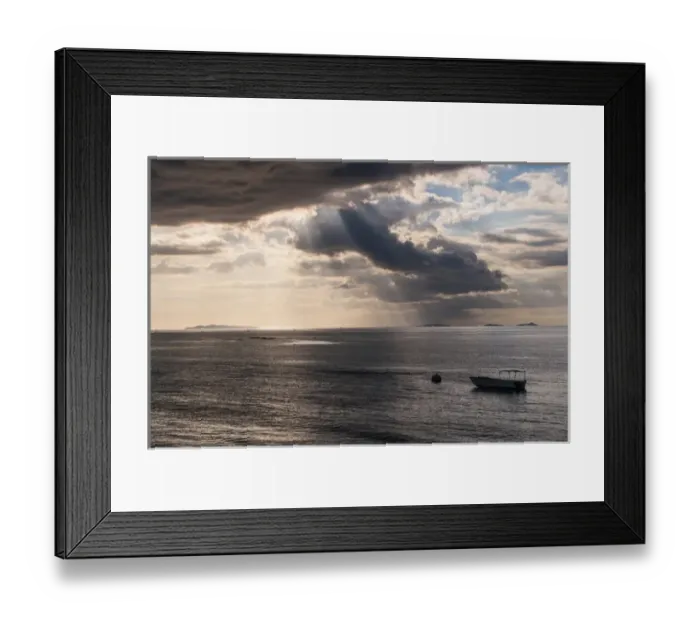 Framed Print : Dramatic light over a little boat, Mamanucas islands, Fiji, South Pacific Framed Print : Dramatic light over a little boat, Mamanucas islands, Fiji, South Pacific