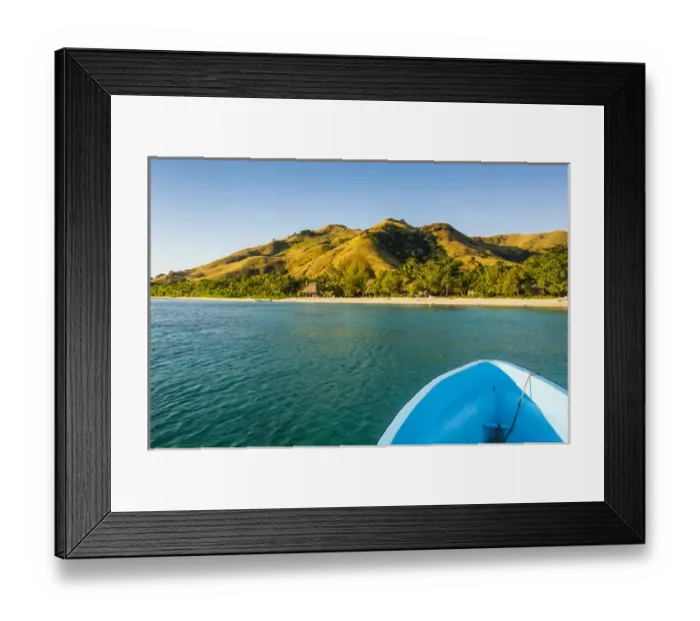 Framed Print : Blue boat cruising through the Yasawas, Fiji, South Pacific