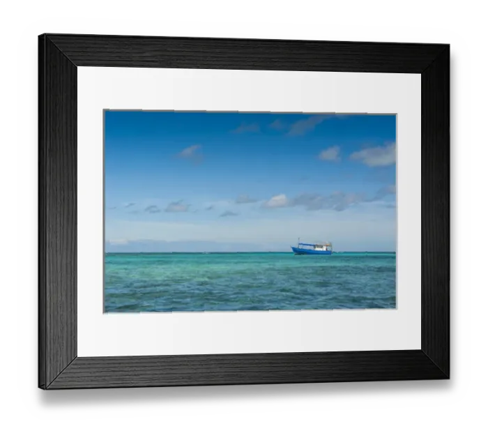 Framed Print : Fishing boat in the turquoise waters of the blue lagoon, Yasawas, Fiji, South Pacific