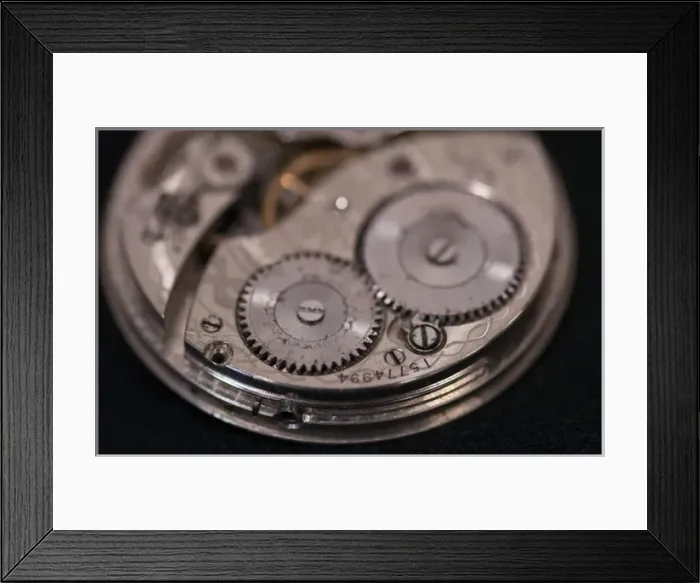 Framed Print : Close Up abstract of internal moving parts of an old watch with wheels of an antique