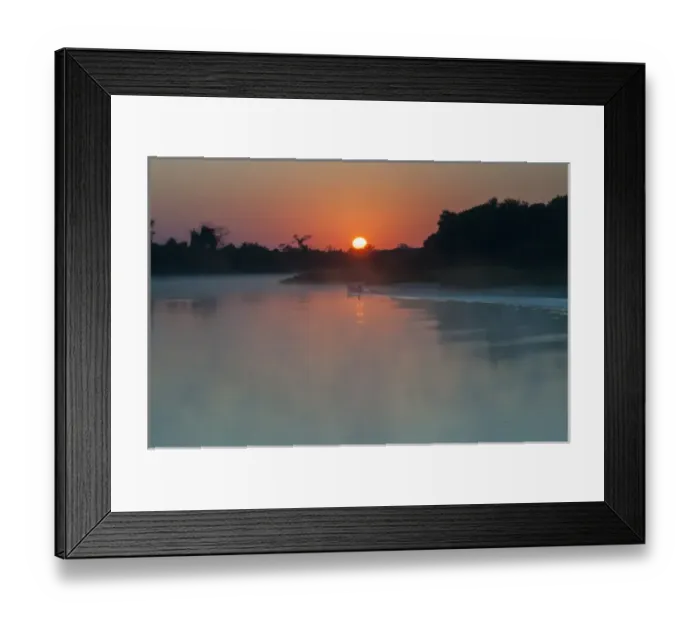 Framed Print : South America, The Pantanal, Brazil, A lone boat at sunrise driving through the rising