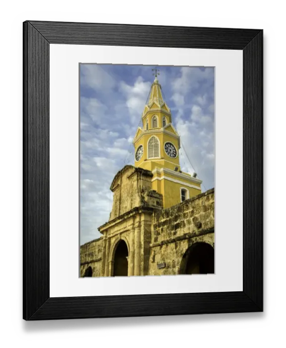 Framed Print : The venerable clock tower - Torre del Reloj - looks out over the Plaza de la Paz