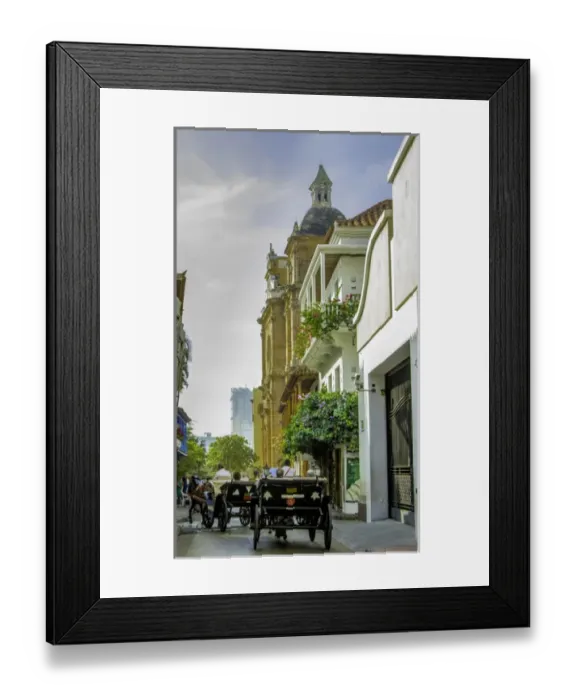 Framed Print : Charming horse-drawn carriages take visitors for tours of historic Cartagena, Colombia Framed Print : Charming horse-drawn carriages take visitors for tours of historic Cartagena, Colombia