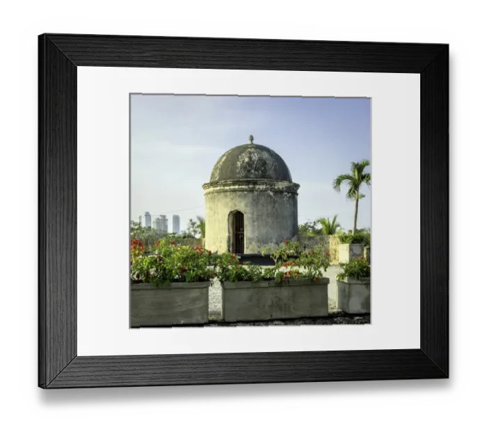 Framed Print : Historic Spanish colonial walls and fortifications surround the Old City of Cartagena Framed Print : Historic Spanish colonial walls and fortifications surround the Old City of Cartagena