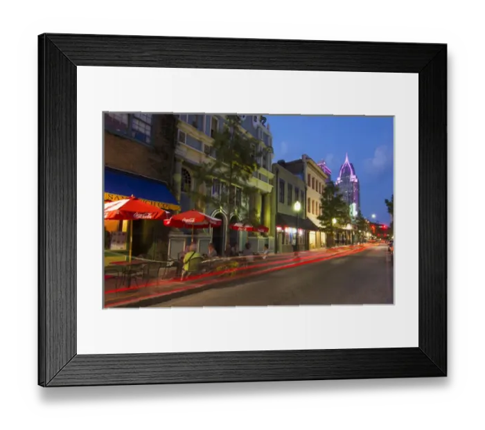 Framed Print : Mobile Alabama downtown traffic on Dauphin Street at twilight with Trustmark Skyscrapper