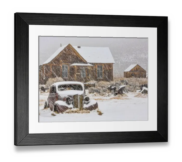 Framed Print : USA, California, Bodie. Abandoned car and buildings in snowfall