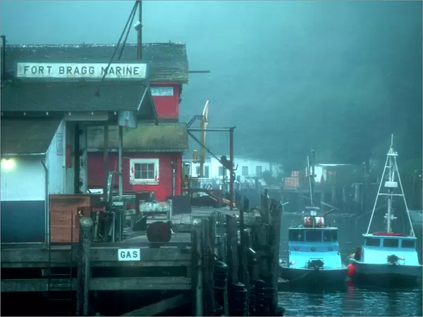 Two fishing boats tied up to pier at Noyo harbor, near Fort Bragg, California