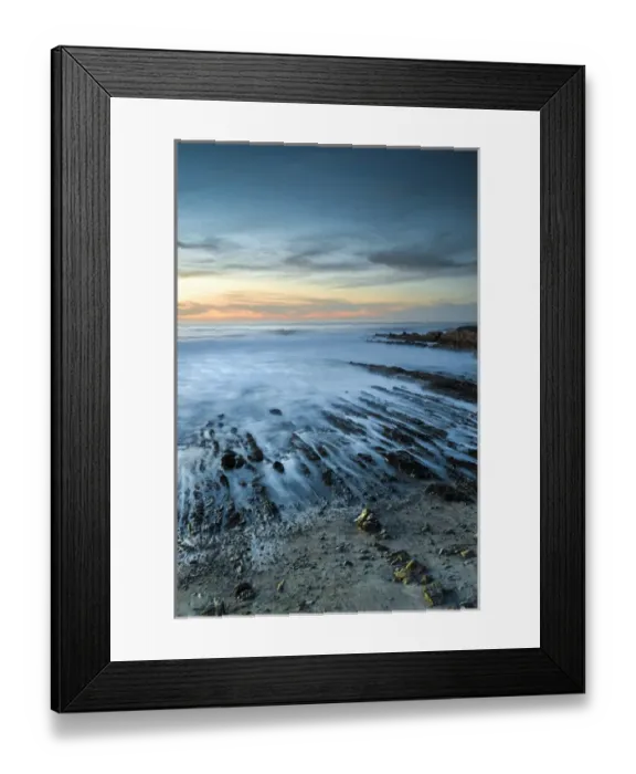Framed Print : North America, USA, California. Sunset on rock formations with ocean at Montana de Oro State Park