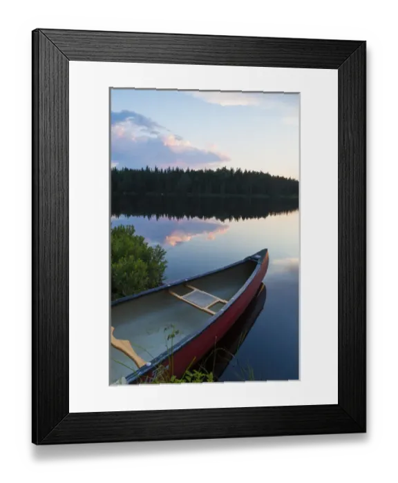 Framed Print : A canoe on Little Berry Pond in Maines Northern Forest. Sunset. Cold Stream watershed
