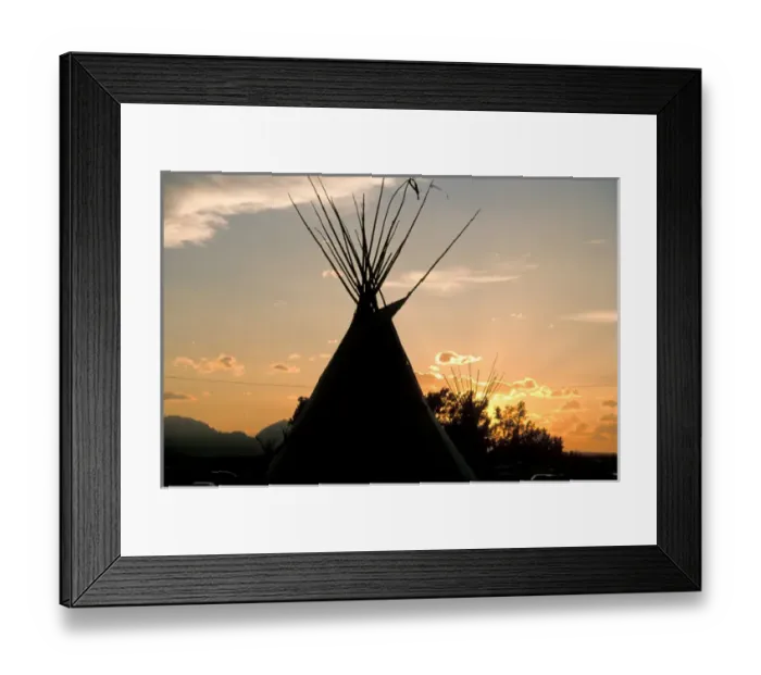 Framed Print : Blackfeet tepees made from canvas stretched over tipi poles at sunset in Browning Montana