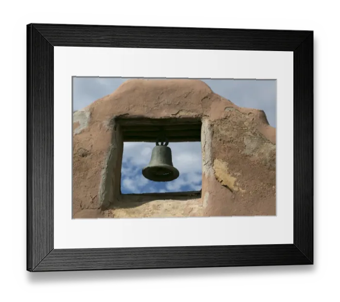 Framed Print : Looking up at a church bell of an adobe building, Taos, New Mexico, USA Framed Print : Looking up at a church bell of an adobe building, Taos, New Mexico, USA