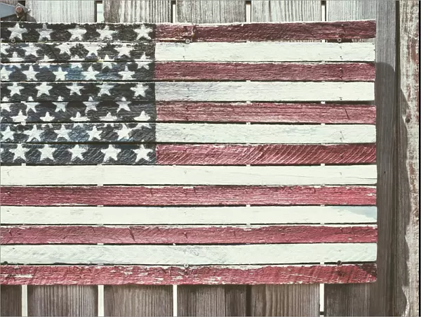 Worn wooden American flag, Fire Island, New York