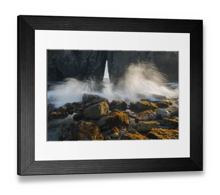 Framed Print : North America, USA, Oregon. Ocean spray over lichen covered rocks at arch, Harris Beach State Park