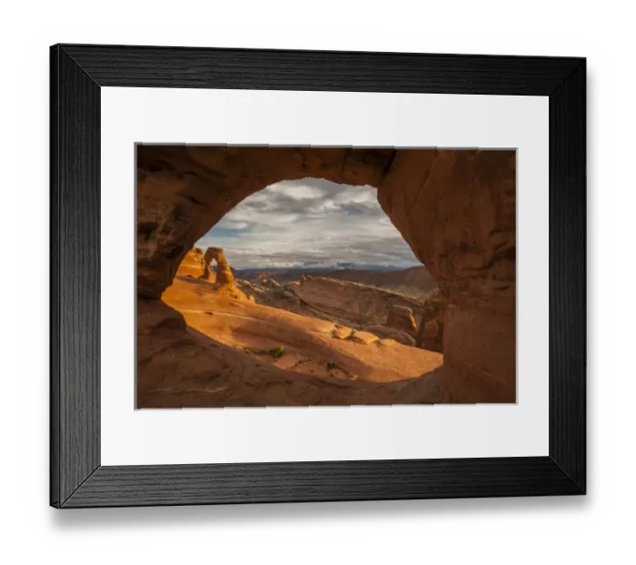 Framed Print : USA, Utah, Arches National Park. Delicate Arch at sunset. through another arch Credit as Framed Print : USA, Utah, Arches National Park. Delicate Arch at sunset. through another arch Credit as