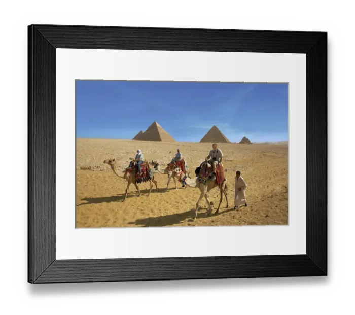 Framed Print : Egypt, Cairo, Giza, Tourists ride with a guide in front of the great pyramids Framed Print : Egypt, Cairo, Giza, Tourists ride with a guide in front of the great pyramids