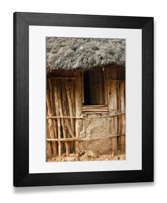 Framed Print : Traditional Konso village on a mountain ridge overlooking the rift valley. Inside a family compound Framed Print : Traditional Konso village on a mountain ridge overlooking the rift valley. Inside a family compound