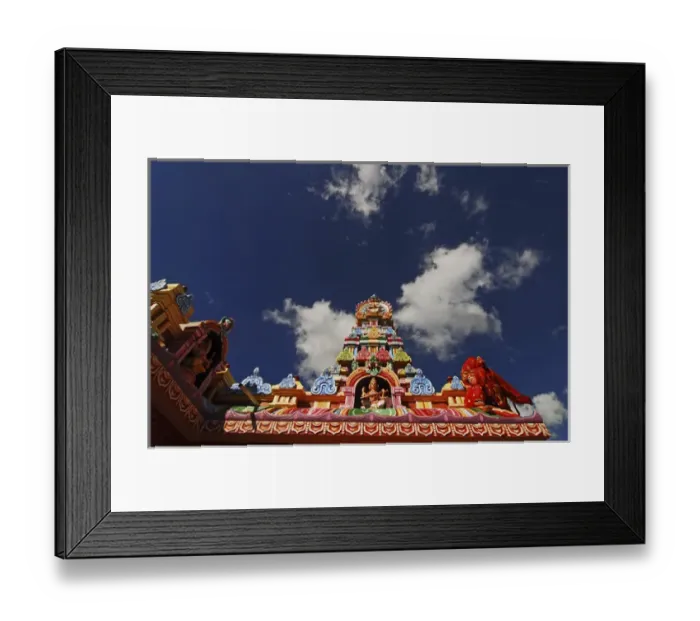 Framed Print : Mauritius, Bambou, low angle view of colorful spire of a Hindu temple with the figurines