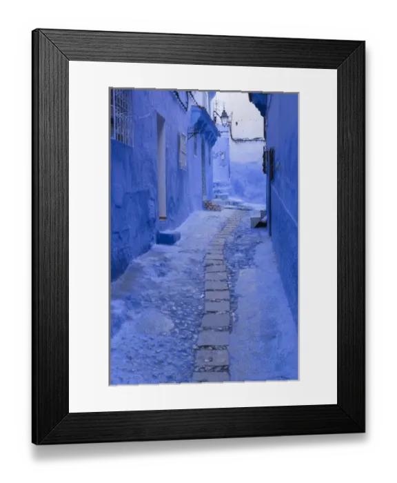 Framed Print : Africa, Morocco, Chefchaouen. A quiet alleyway in blue, the typical paint color of Framed Print : Africa, Morocco, Chefchaouen. A quiet alleyway in blue, the typical paint color of