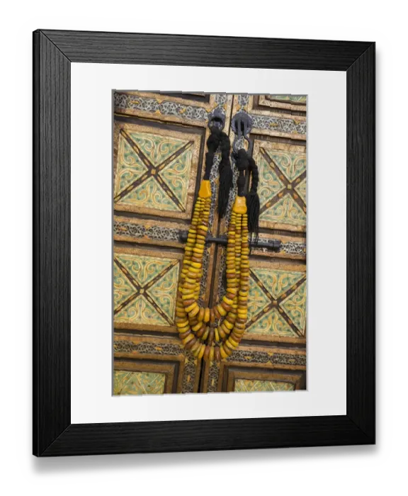 Framed Print : Africa, Morocco, Tinerhir. Traditional necklace of Berber woman hangs on an ornate