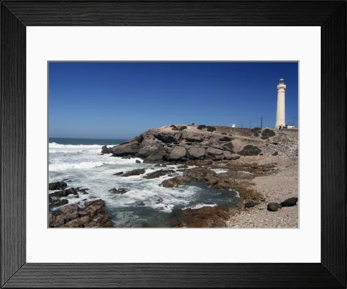 Framed Print : Africa, Morocco, Casablanca. Surfside view from La Mer restaurant of El Hank Lighthouse