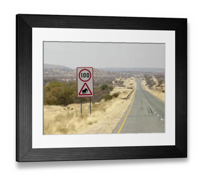 Framed Print : Africa, Namibia, Etosha National Park. Speed limit and elephant caution sign. Credit as Framed Print : Africa, Namibia, Etosha National Park. Speed limit and elephant caution sign. Credit as