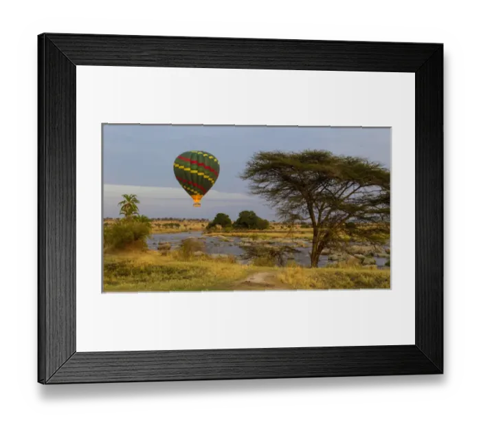 Framed Print : Africa. Tanzania. Hot air balloon crossing the Mara river in Serengeti NP Framed Print : Africa. Tanzania. Hot air balloon crossing the Mara river in Serengeti NP
