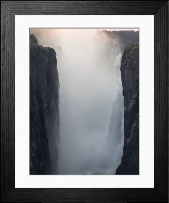 Framed Print : Africa, Zimbabwe, Victoria Falls. Waterfall and spray at sunrise