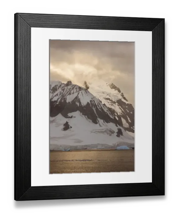 Framed Print : Antarctica, Errera Channel, Georges Point, Ronge Island. Rising sun shines through cloud cover Framed Print : Antarctica, Errera Channel, Georges Point, Ronge Island. Rising sun shines through cloud cover