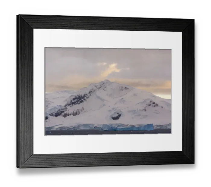 Framed Print : Antarctica. Antarctic Peninsula. Paradise Harbor. Snowy mountains and clouds at sunrise