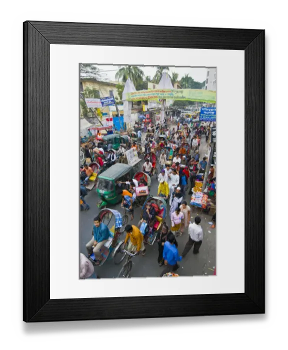 Framed Print : Very busy Rickshaw traffic on a street crossing in Dhaka, Bangladesh, Asia Framed Print : Very busy Rickshaw traffic on a street crossing in Dhaka, Bangladesh, Asia